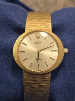 ROLEX CELLINI 14K YELLOW GOLD LADIES 27MM MIDSIZE WATCH.