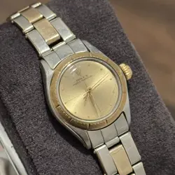 ROLEX  OYSTER PERPETUAL REF. 6719 • 26MM • CHAMPAGNE ZEPHYR DIAL