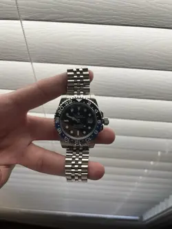 ROLEX GMT-MASTER II 126710BLNR SILVER OYSTER WITH BLUE AND BLACK, SIZE 41 MM