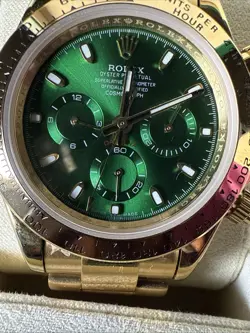 ROLEX COSMOGRAPH DAYTONA 116508 40MM GREEN DIAL WITH YELLOW GOLD OYSTER BRACELET