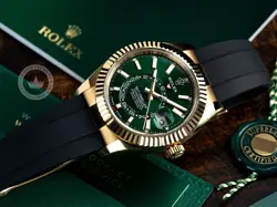 ROLEX 336238 SKYDWELLER 18K YELLOW GOLD WITH GREEN DIAL ON OYSTERFLEX