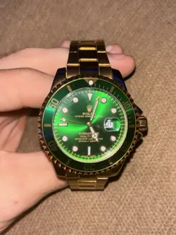 ROLEX SUBMARINER 16618 GOLD OYSTER BRACELET WITH BLACK BEZEL