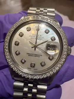 ROLEX DATEJUST 1601 MENS STAINLESS STEEL WATCH WITH DIAMOND BEZEL.