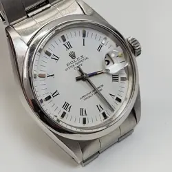 ROLEX DATE 34 MM WHITE ROMAN OYSTER STEEL OYSTER AUTOMATIC WATCH 1500 CIRCA 1970