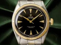 ROLEX OYSTER PERPETUAL SEMI-BUBBLEBACK REF.6085 BLACK GILT DIAL YG/SS