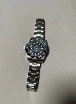 ROLEX GMT-MASTER II SPRITE SILVER OYSTER BRACELET WITH GREEN/BLACK BEZEL USED