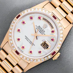 ROLEX MENS DAYDATE MOP RUBY DIAL DIAMOND BEZEL - 18K YELLOW GOLD PRESIDENT WATCH