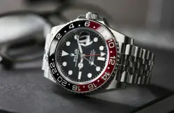 ROLEX  GMT MASTER II STAINLESS STEEL WATCH WITH BLACK DIAL AND COKE BEZEL