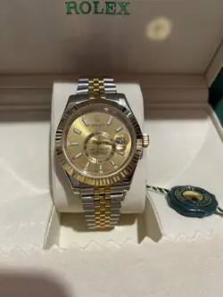 ROLEX SKY-DWELLER  YELLOW GOLD AND STAINLESS STEEL GOLDEN