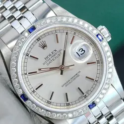 DIAMOND-SAPPHIRE BEZEL WATCH