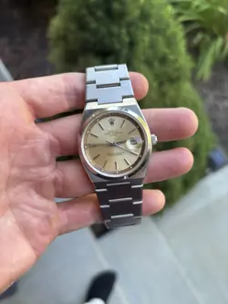 ROLEX OYSTER PERPETUAL DATE STAINLESS STEEL 36MM SILVER AUTOMATIC WATCH 1530