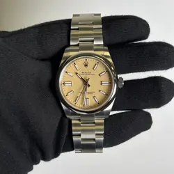 Rolex Oyster Perpetual 41mm Beige Dial Watch 134300