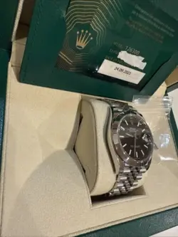 Rolex Datejust 126300 - Jubilee Bracelet with Silver Bezel Black dial-41mm