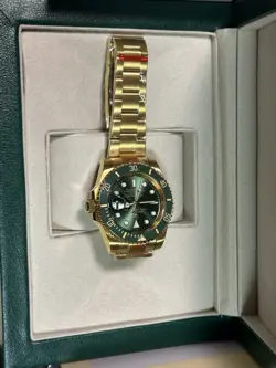 ROLEX MEN'S SUBMARINER DATE GREEN CERAMIC BEZEL 18K  YELLOW GOLD