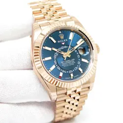 ROLEX 336935 SKYDWELLER 18K ROSE GOLD WITH BLUE-GREEN DIAL ON JUBILEE
