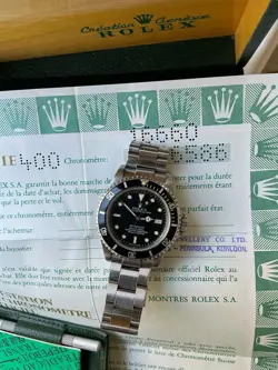 ROLEX SEA-DWELLER 16660  PATINA DIAL WITH BOX AND PAPERS