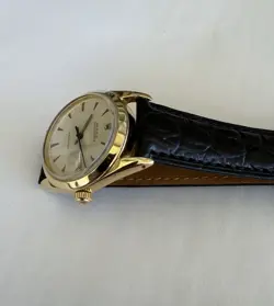 1225