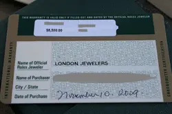 ROLEX 16610LV GREEN SUBMARINER WATCH 50TH ANNIV V SERIAL