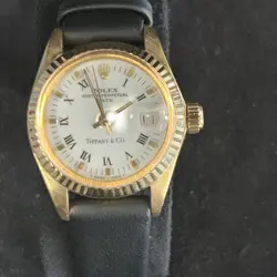 ROLEX TIFFANY OYSTER PERPETUAL LADIES LEATHER STRAP YELLOW 18K GOLD SERVICED
