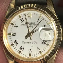 Rolex TIFFANY Oyster Perpetual Ladies leather strap yellow 18K gold SERVICED