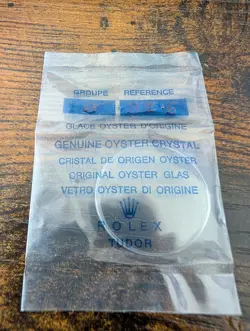 ROLEX TUDOR - NOS ORIGINAL OYSTER PLASTIC CRYSTAL NO CYCLOPS WINDOW - PART 27.6