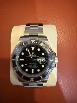 BRAND NEW ROLEX SUBMARINER 126610LN SILVER OYSTER BRACELET WITH BLACK BEZEL