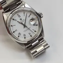 ROLEX DATE 34 MM STEEL WHITE ROMAN OYSTER AUTOMATIC WATCH 1500 CIRCA 1979