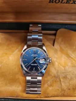 ROLEX OYSTER PERPETUAL DATE 1500 BLUE DIAL AUTOMATIC WATCH