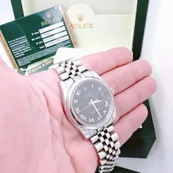 Men's Rolex 36mm DateJust Steel Watch with Sunbeam Roman Numeral Black Dial.