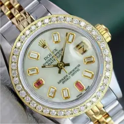 ROLEX DATEJUST LADIES TWOTONE GOLD STEEL WHITE MOTHER OF PEARL BAGUETTE WATCH