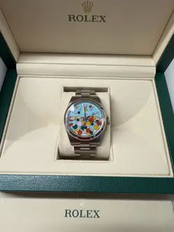 ROLEX OYSTER PERPETUAL 41MM STEEL CELEBRATION DIAL OYSTER AUTOMATIC WATCH 124300