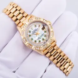EMERALD DIAL 18K