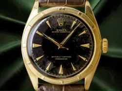 ROLEX SEMI-BUBBLEBACK REF.6085 14KYG BLACK GILT DIAL ENGINE TURNED BEZEL 1951