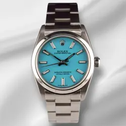 ROLEX OYSTER PERPETUAL 31MM STAINLESS STEEL BABY BLUE DIAL WATCH REF 67480