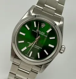 ROLEX OYSTER PERPETUAL 31MM STAINLESS STEEL GREEN DIAL WATCH REF 67480