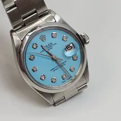 ROLEX DATE 34 MM BLUE TURQUOISE DIAMOND DIAL STEEL OYSTER WATCH 1500 CIRCA 1973