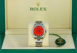 ROLEX OYSTER PERPETUAL 31MM, CORAL RED DIAL, SMOOTH BEZEL - STEEL OYSTER, 277200