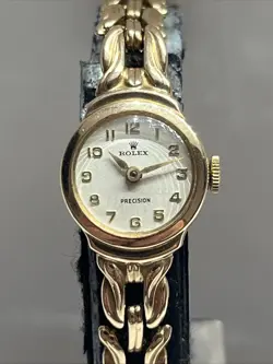 GOLD ROLEX PRECISION