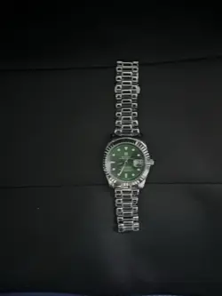 ROLEX DESIGNER WATCH FOR MEN AND GREAT CONDITION BRAND NEW AND HASN’T BEEN WORN