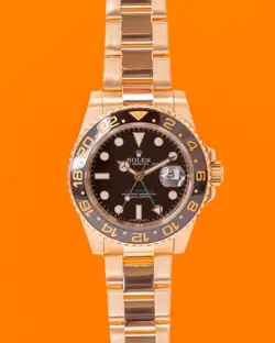 ROLEX GMT MASTER II 40MM 116718 YELLOW GOLD BLACK DIAL 2006
