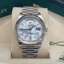 ROLEX DAY-DATE 40 MOTHER OF PEARL BAGUETTE DIAL WHITE GOLD PRESIDENT REF: 228239