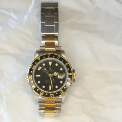 ROLEX GMT-MASTER II 16713 BLACK TWO-TONE YELLOW GOLD AND STEEL OYSTER WATCH