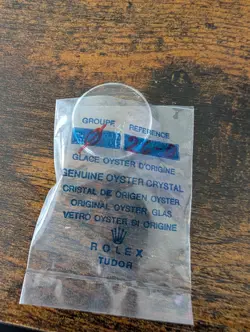 ROLEX TUDOR - OPEN UNUSED ORIGINAL PLASTIC CRYSTAL NO CYCLOPS WINDOW - PART 26.0