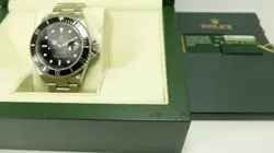ROLEX STAINLESS STEEL SUBMARINER 16610 REHAUT SERIAL 2008 UNPOLISHED BOX PAPERS