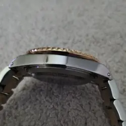 PRE-OWNED ROLEX SUBMARINER