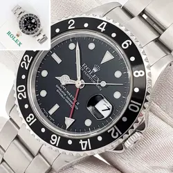 ROLEX GMT-MASTER II 40MM STEEL WATCH 16710 PAPERS