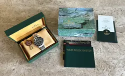 ROLEX GMT-MASTER II 40MM BLACK BEZEL STEEL WATCH 16710 BOX PAPERS