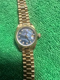 WITH 18K GOLD