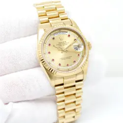 ROLEX 18238 DAY DATE 18K YELLOW GOLD WITH CHAMPAGNE DIAMOND STRING RUBY DIAL
