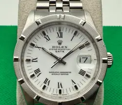 ROLEX 15210 DATE 34MM STEEL ENGINE TURNED WHITE ROMAN DIAL WATCH